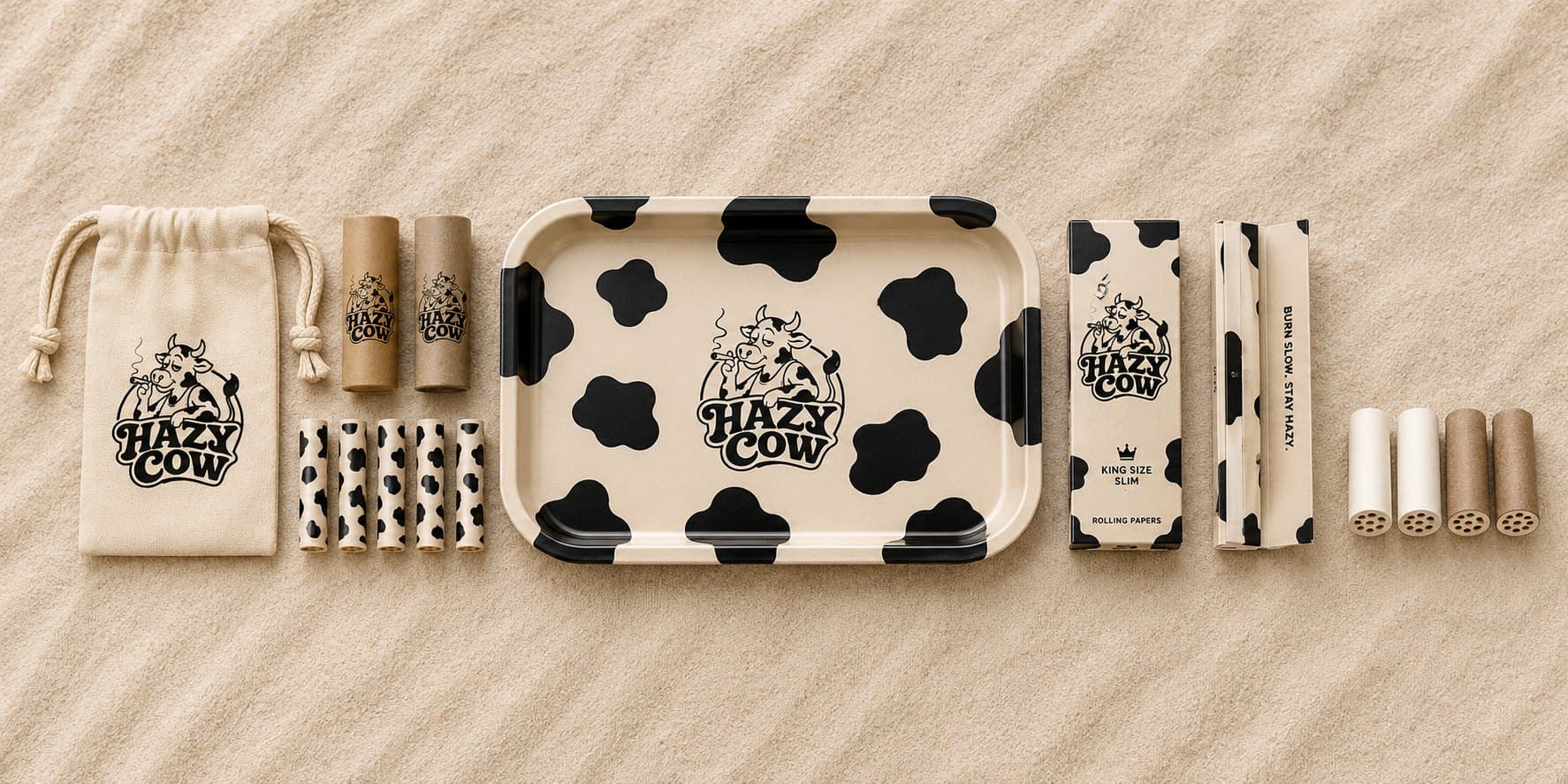 The full Hazy Cow range laid out in a row: pouch, filters, tray and papers